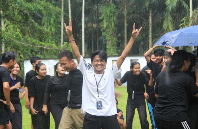 A group of people standing in the rainAI-generated content may be incorrect.