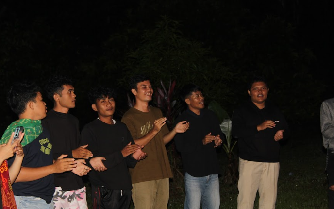 A group of men standing togetherAI-generated content may be incorrect.