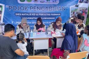 Tingkatkan Kesadaran Hidup Sehat Masyarakat, BEM Famul dan GenBI Unmul Gelar Cek Kesehatan Gratis